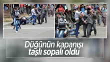 Düğünün kapanışı taşlı sopalı oldu