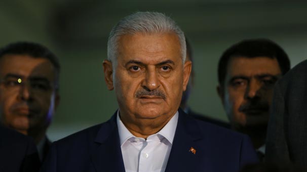 Turkey's Prime Minister Binali Yildirim speaks to the press at the Ataturk airport in Istanbul, Turkey, following a multiple suicide bombing, June 29, 2016. . REUTERS/Murad Sezer