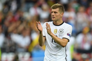 Germany's midfielder Toni Kroos greets the crowd followint the Euro 2016 group C football match between Germany and Poland at the Stade de France stadium in Saint-Denis near Paris on June 16, 2016. / AFP / PATRIK STOLLARZ        (Photo credit should read PATRIK STOLLARZ/AFP/Getty Images)